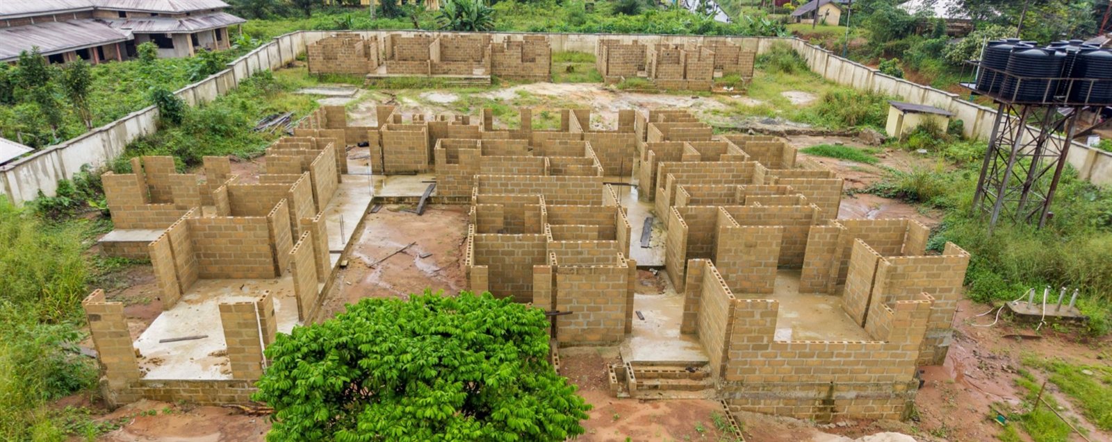 Aerial view of block walls rising on the health centre site
