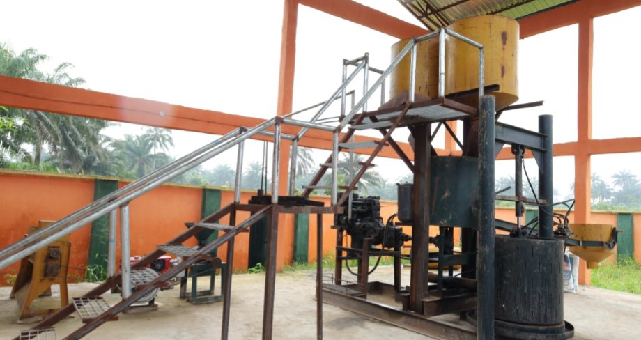Press and mixing machines inside the palm oil mill shed