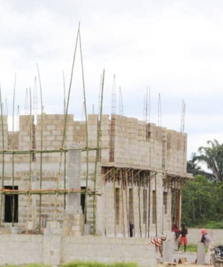 Block walls and bamboo scaffolding on the chairman's lodge
