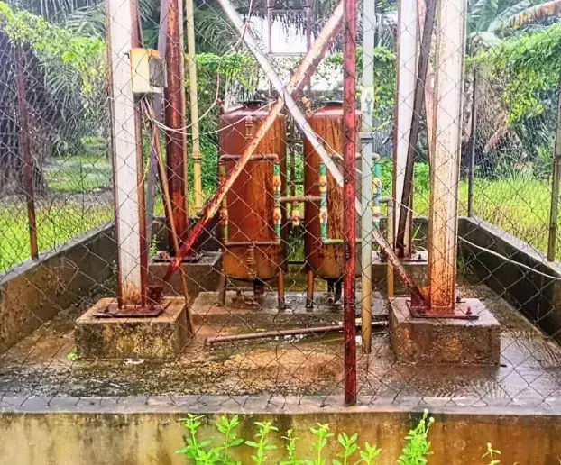 Treatment tanks and pipework at the base of the water tower, Isiotoyo solar water facility.