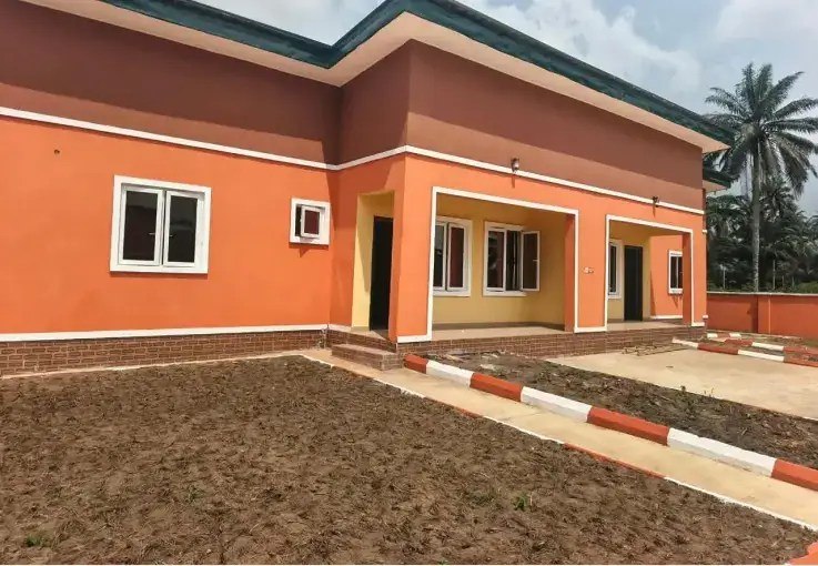 Side view of the health centre with kerbed paving