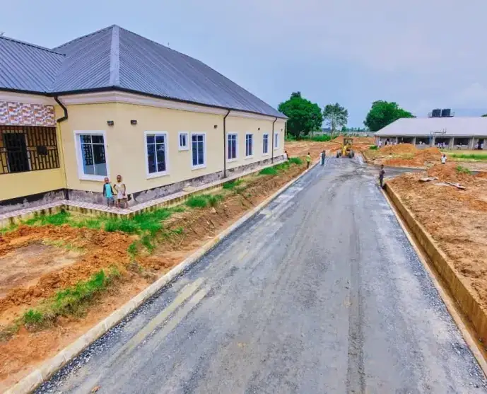 Road works near school buildings in Eket, probably St Francis Secondary School