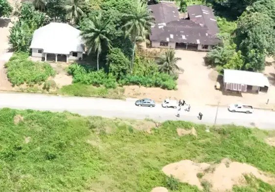 Aerial view of houses beside the new road