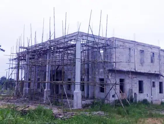 Two storey residence under construction with bamboo scaffolding