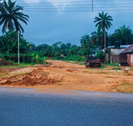 Midim Atan-Ikot Imonte Road, section with fresh asphalt beside a dirt stretch