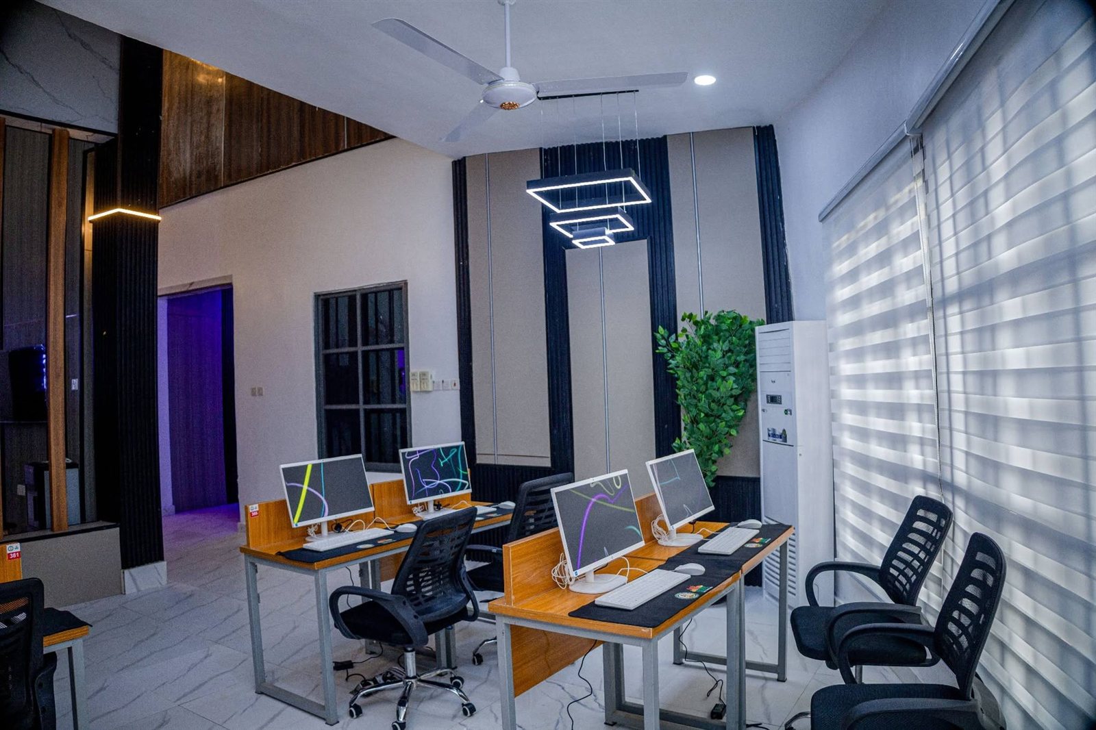 Computer workstations in a furnished room of the centre