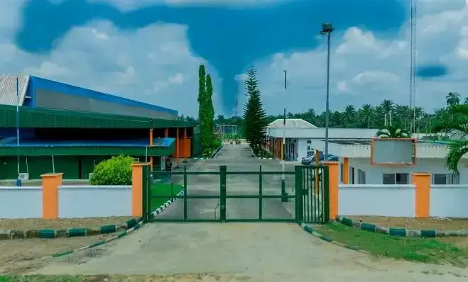 The gate of the Ibom Paints factory at Ikot Ekan