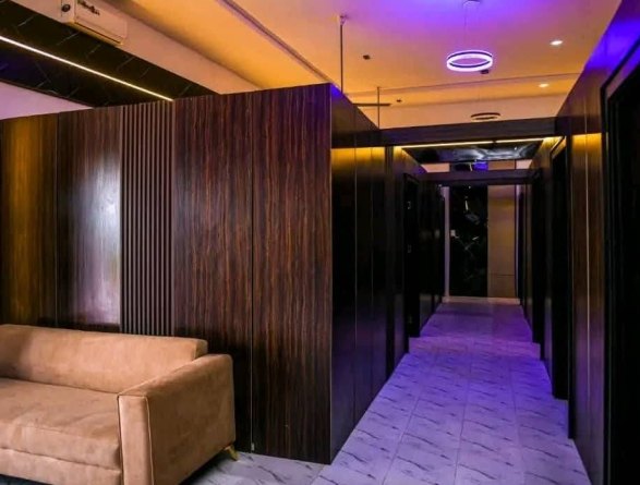 Interior corridor of the completed youth centre with lounge seating