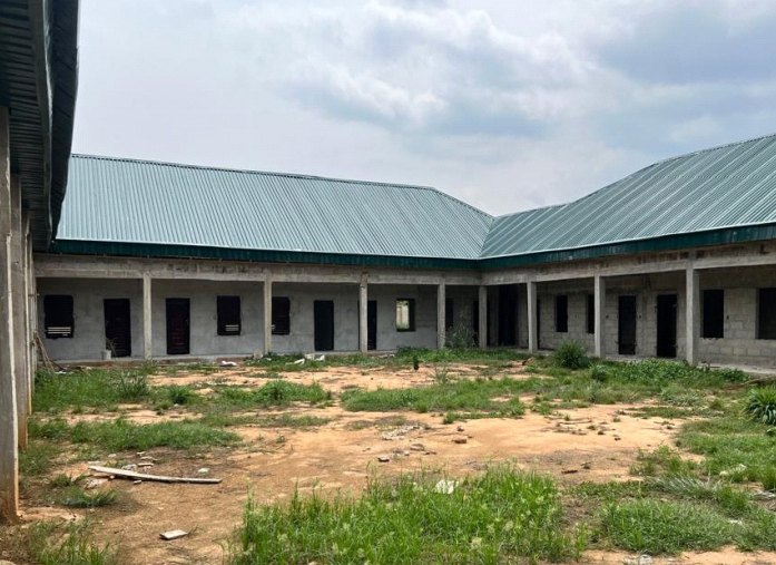 Classroom block with courtyard and new roof, Ndiya Mfia model school