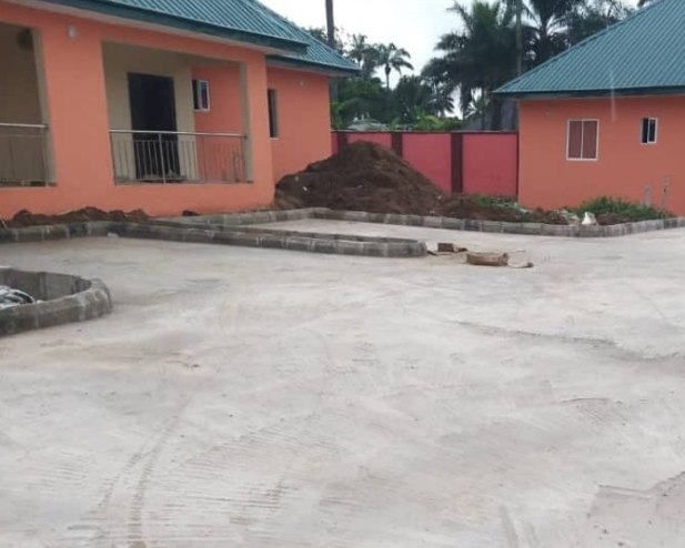 Remodelled school buildings and paved forecourt, Ikot Akpa Edok