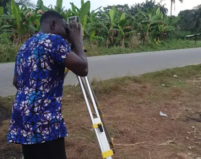 Survey work at the Model Health Centre site, Ikot Etim, Ukpom