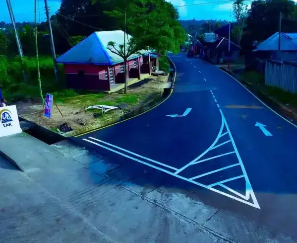 Access road to Goretti Secondary School (Spring Road) with outfall drain