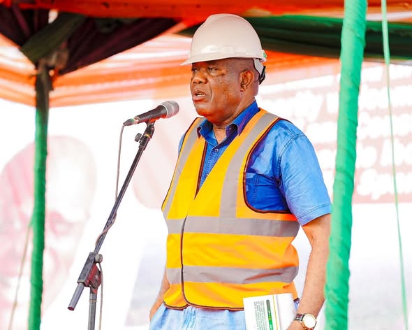 Site engineer in safety gear speaking at the flag-off, 14 February 2024