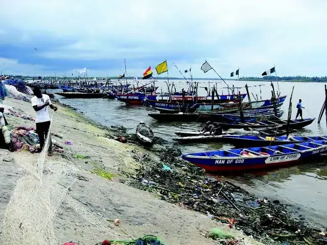 Fishing boats on a shoreline in Mbo LGA