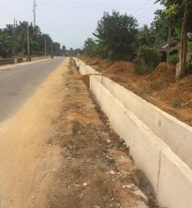 A new concrete drain beside the road