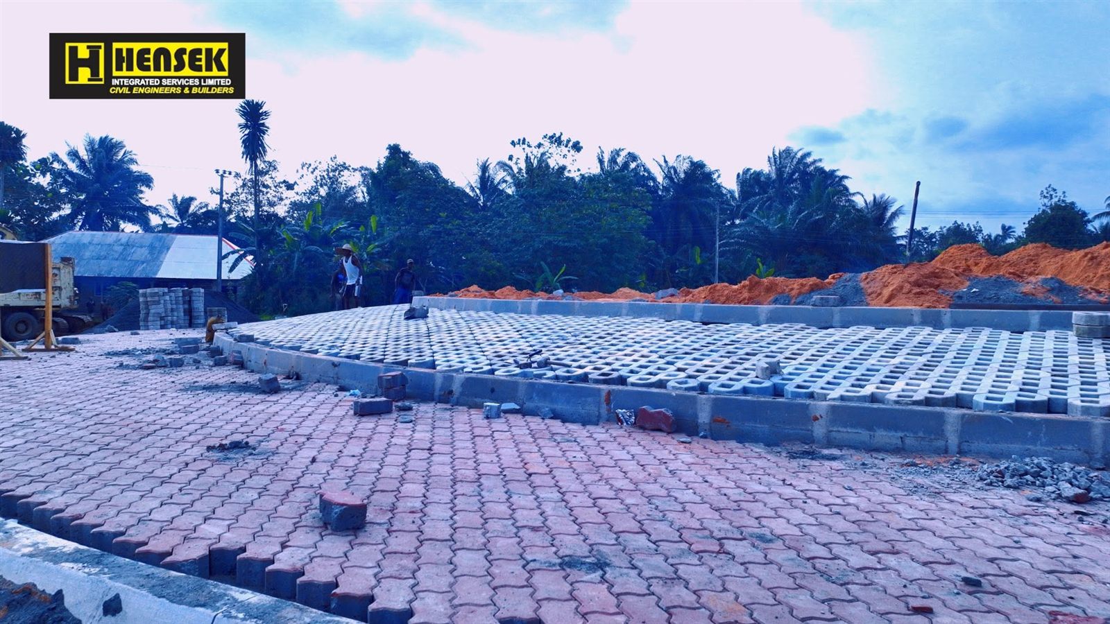 Interlocking paving and kerb works along the road