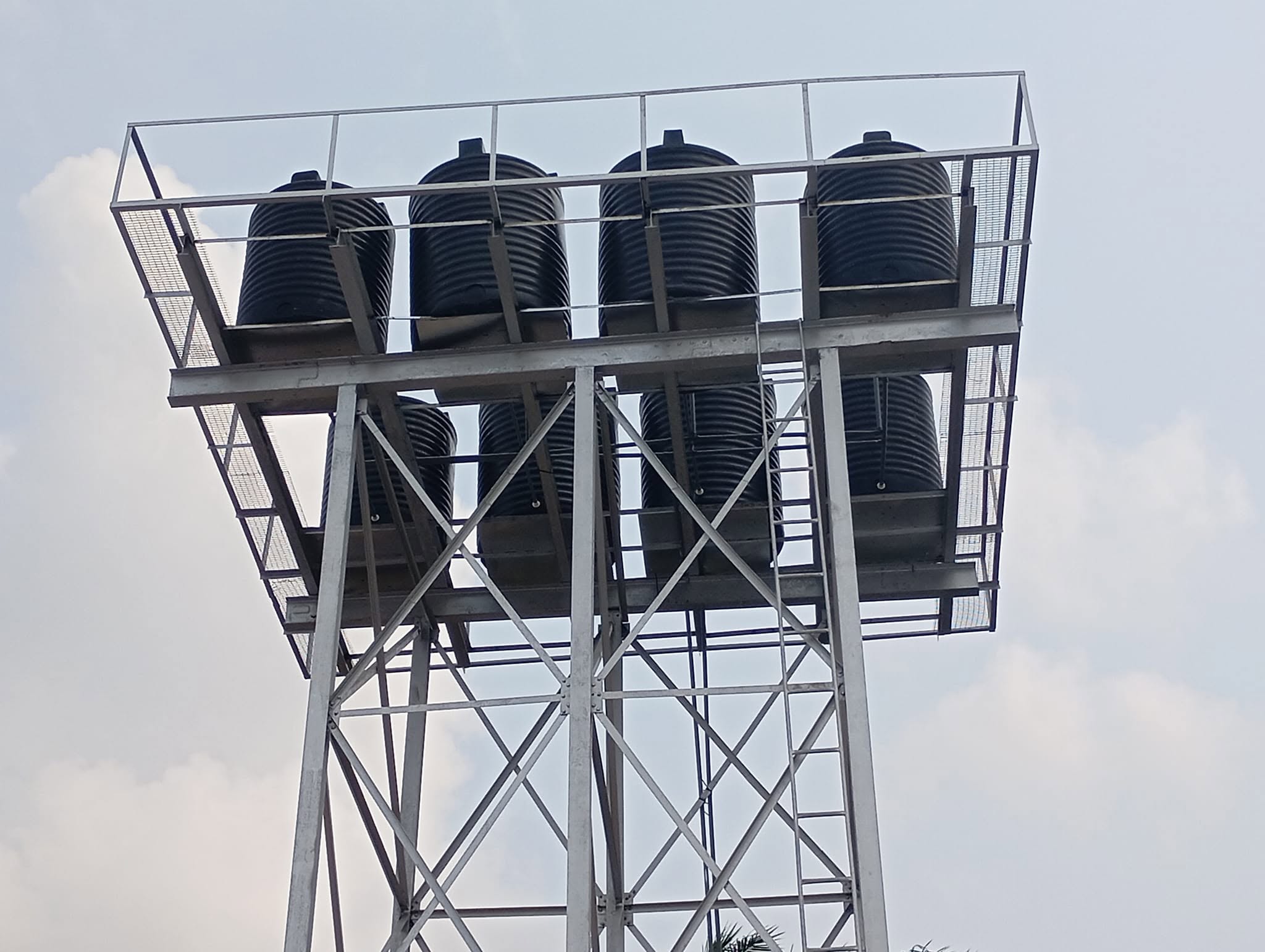 Close view of the water tanks on the steel tower at Ekpene Ikpan