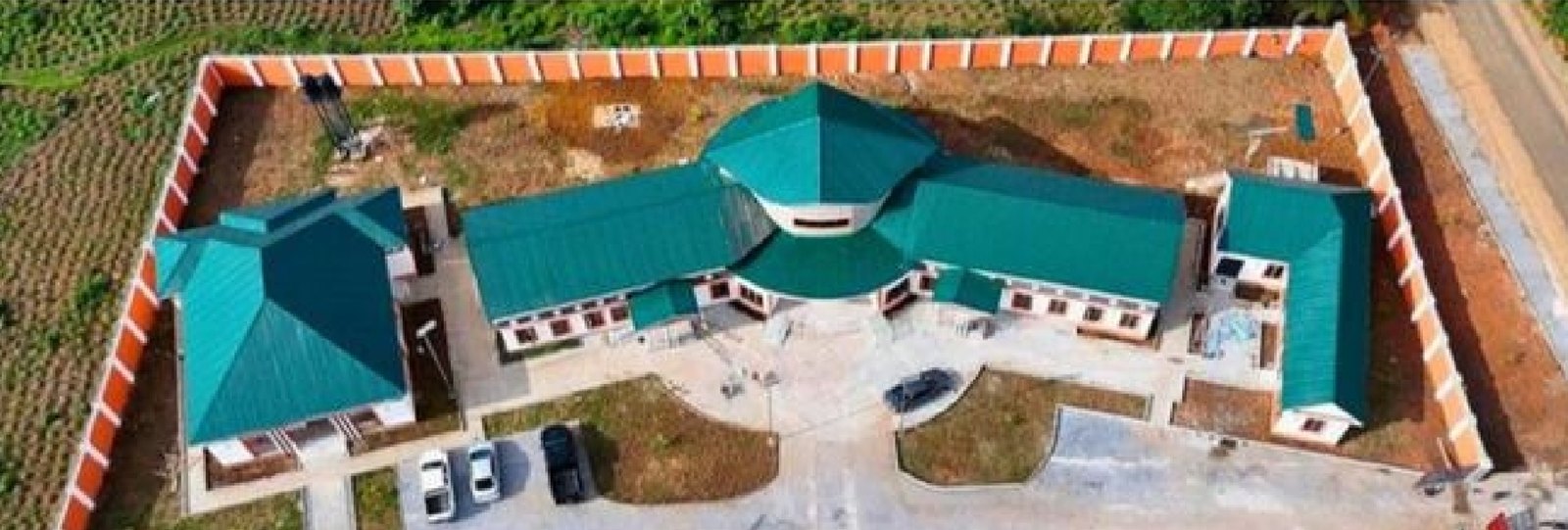 Aerial view of the youth centre inside its perimeter wall