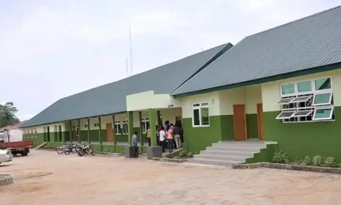 Long single-storey building with a green roof.