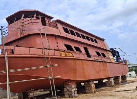 A ferry hull under construction at Oron
