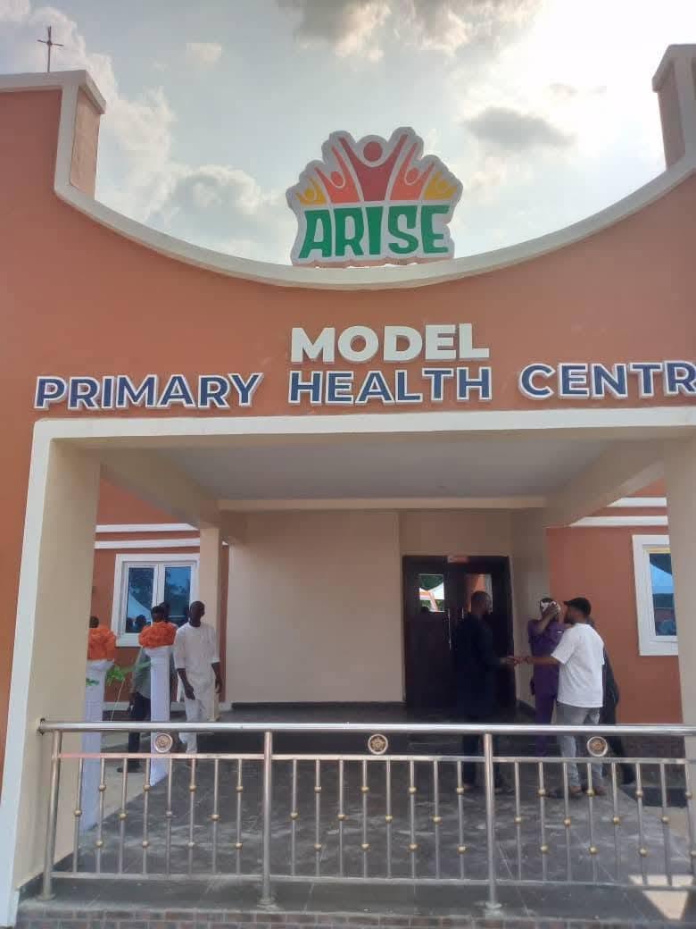 Entrance of the ARISE Model Primary Health Centre with its name sign