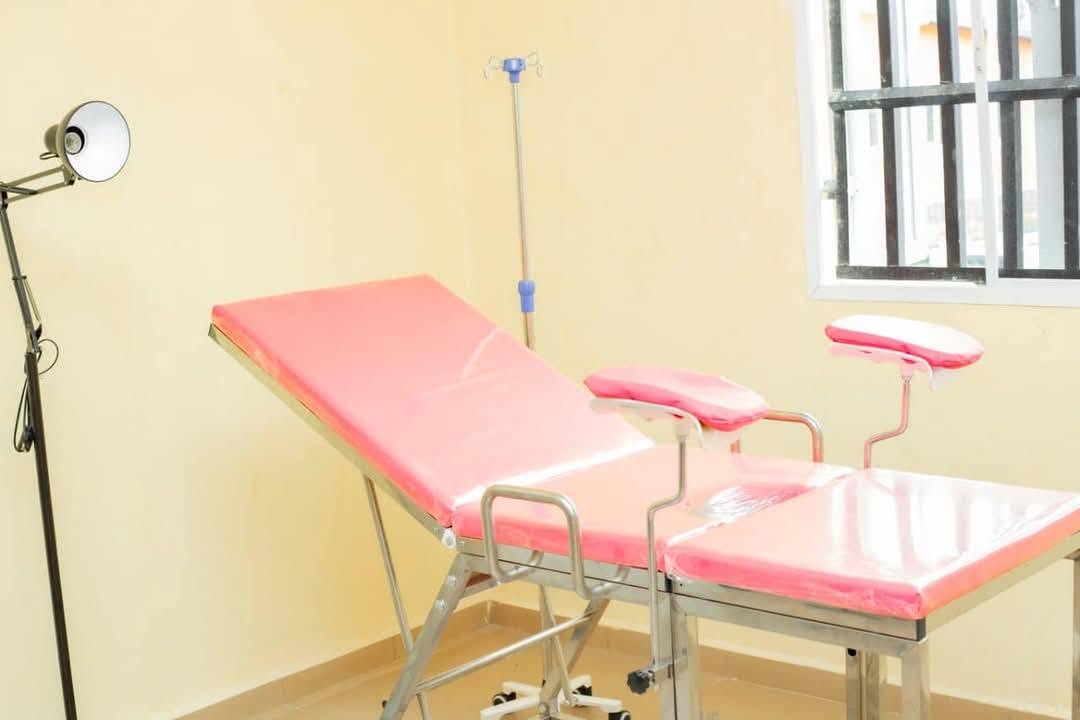 Delivery couch and drip stand in an examination room