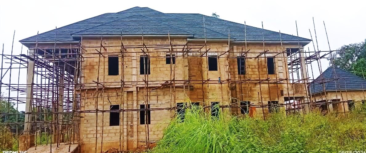 Chairman's lodge walls and scaffolding seen from a wider angle