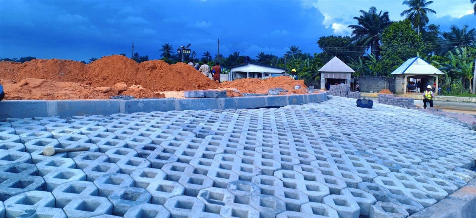 Grass paver blocks laid at the roadside during construction