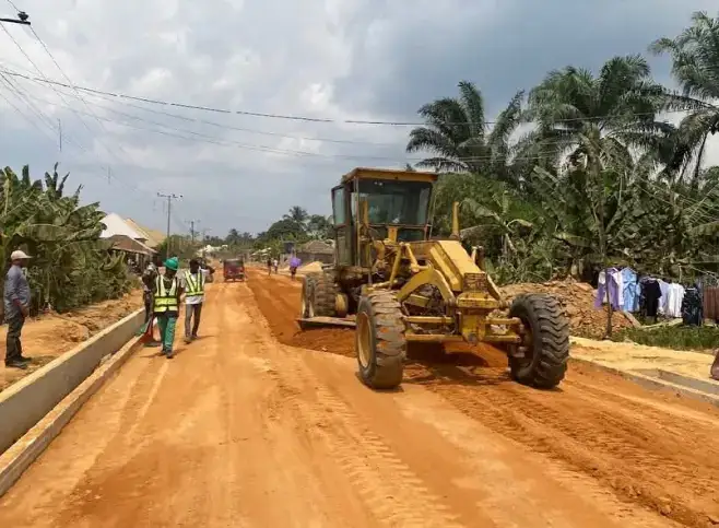 Grader at work on the Adadia - Esuk - Odu Road
