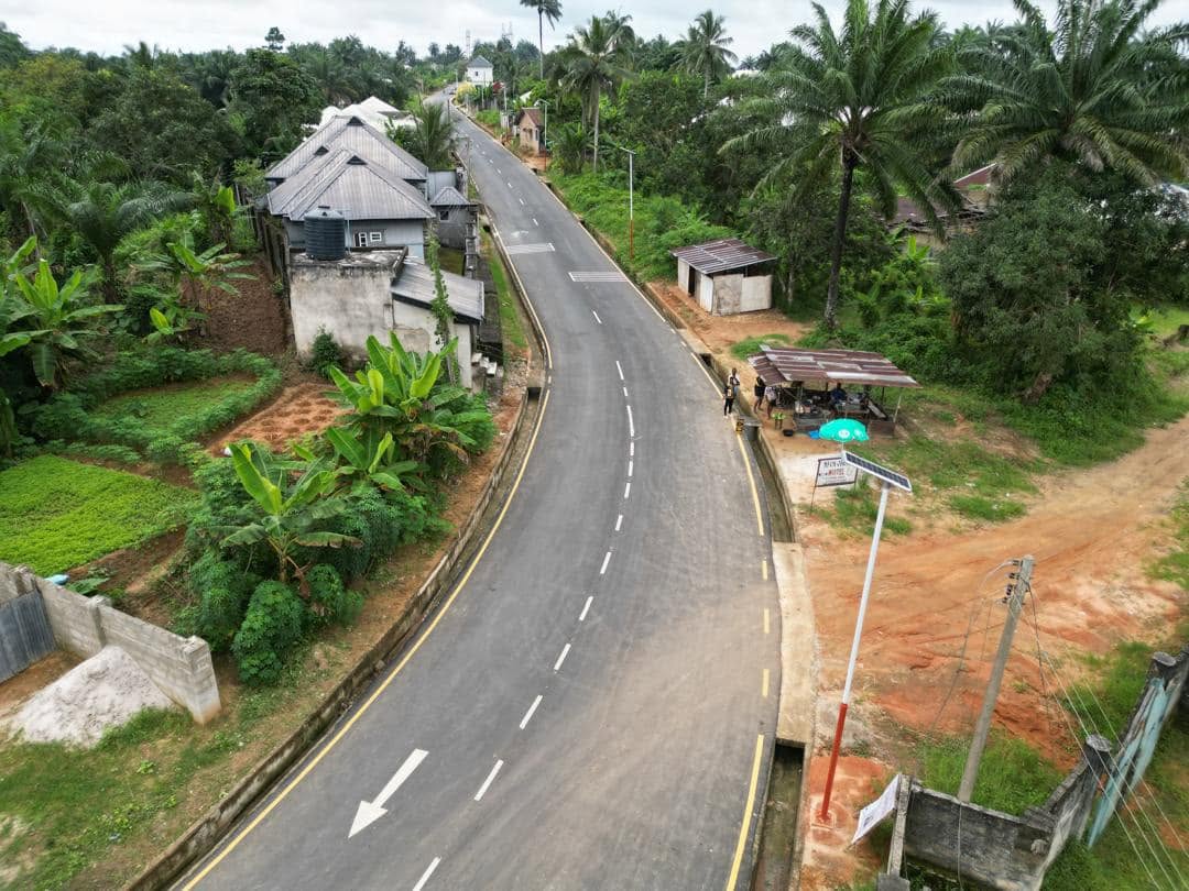 The road towards Ibotong, with road markings and solar street lights