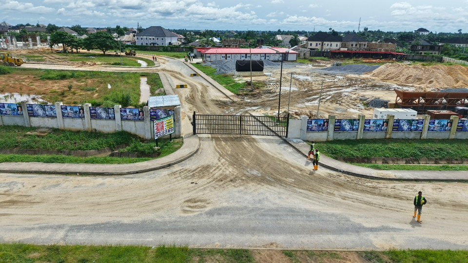 The site entrance and fence