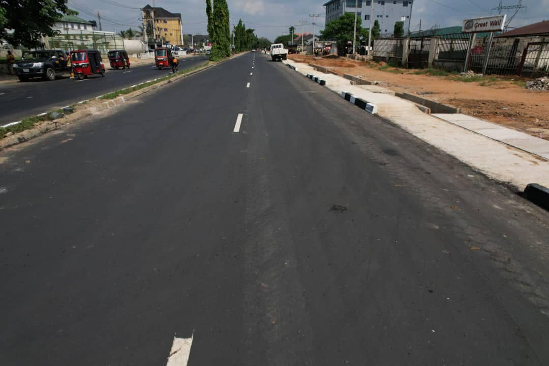 New asphalt and covered drain along Atiku Abubakar Way