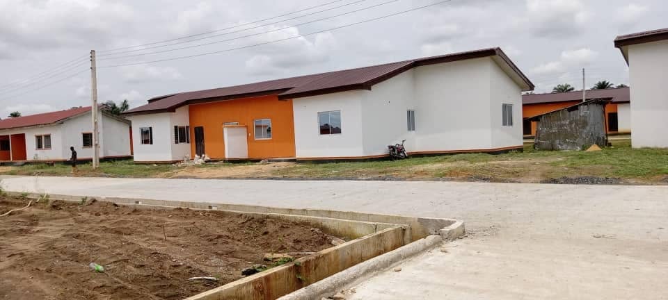 Two-bedroom houses along a new concrete road