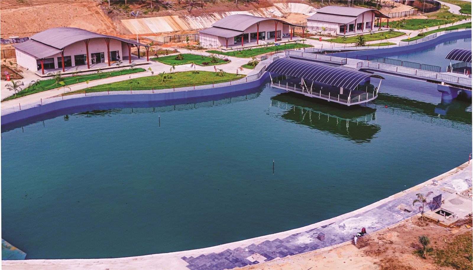 Artificial lake with a floating bar